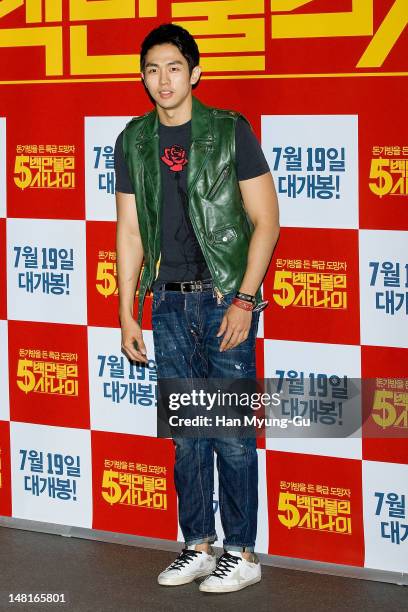Seul-Ong of South Korean boy band 2AM attends the 'A Millionaire On The Run' VIP screening on July 11, 2012 in Seoul, South Korea. The film will open...