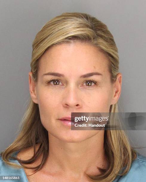 In this handout image provided by the Santa Barbara Police Department, chef Cat Cora is seen in a police booking photo taken June 28, 2012 in Santa...