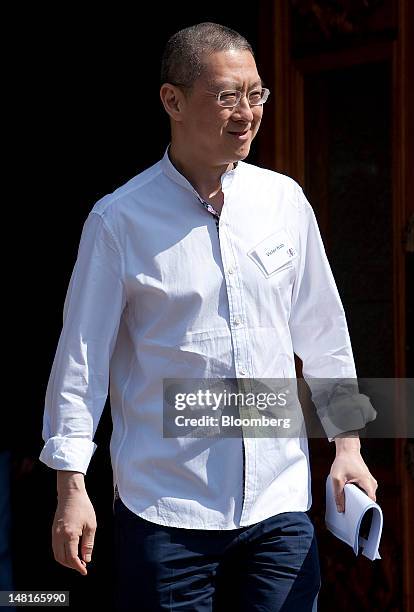 Victor Koo, chief executive officer of Youku Inc., leaves the morning session at the Allen & Co. Media and Technology Conference in Sun Valley,...