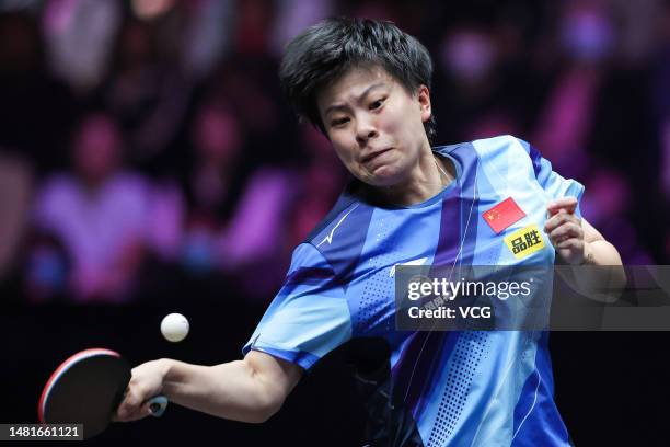 Wang Yidi of China competes against Cheng I-ching of Chinese Taipei in their Women's Singles Round of 16 match on day four of WTT Champions Xinxiang...