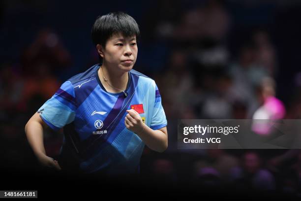 Wang Yidi of China reacts against Cheng I-ching of Chinese Taipei in their Women's Singles Round of 16 match on day four of WTT Champions Xinxiang...