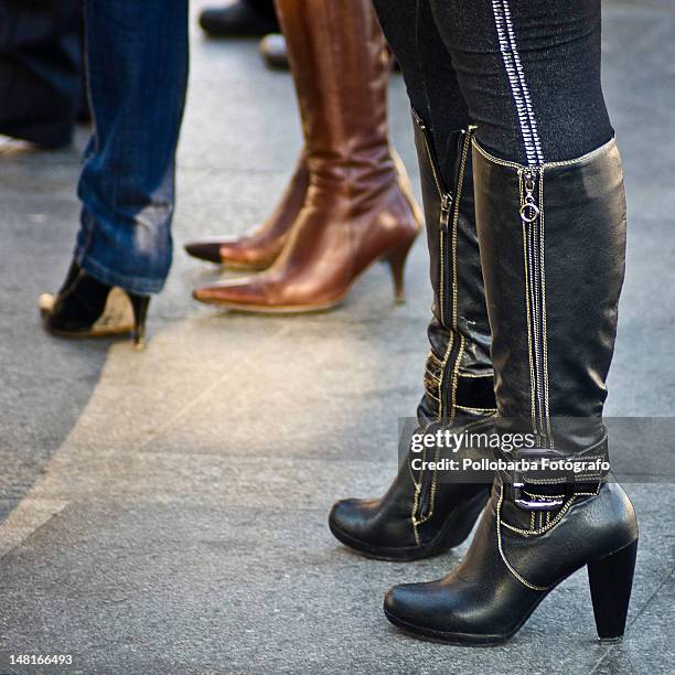 heels and steel - high heels boots stock pictures, royalty-free photos & images