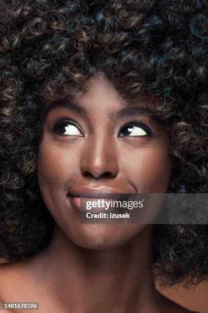 beauty closeup of young woman with afro hair - close up lips stock pictures, royalty-free photos & images