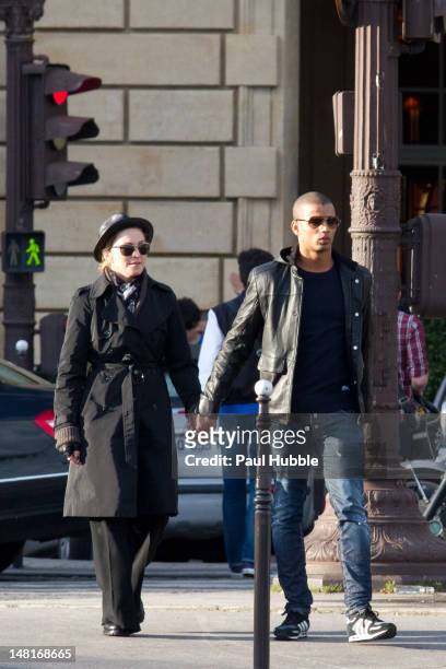 Madonna and Brahim Zaibat are seen on the Place de la Concorde on July 11, 2012 in Paris, France.