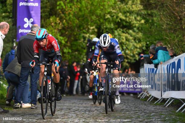 Andreas Kron of Denmark and Team Lotto Dstny and Rémi Cavagna of France and Team Soudal - Quick Step compete in the breakaway during the 63rd De...