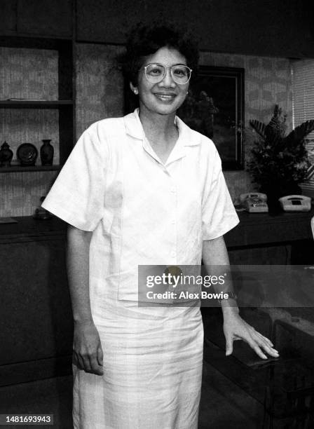 Smiling Corazon Aquino stikes a casual pose in her office one week after her inauguration as President of the Philippines, 5th March 1986. Aquino...