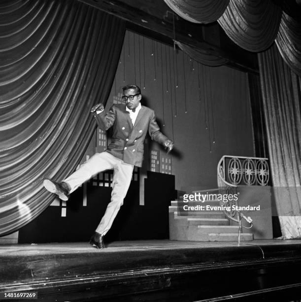 American entertainer Sammy Davis Jr dancing on stage during a Royal Command Performance variety show, Victoria Palace Theatre, London, May 16th 1960.