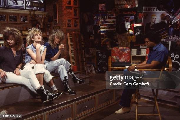 View of, from left, Pop singers Keren Woodward, Siobhan Fahey, and Sara Dallin, all of the group Bananarama, and MTV VJ JJ Jackson during an...