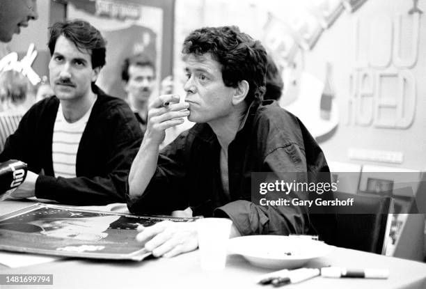 View of American Rock musician Lou Reed as he promotes his 'New Sensations' album at Greenwich Village's Tower Records, New York, New York, June 21,...