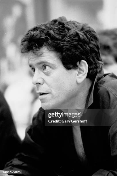 Close-up of American Rock musician Lou Reed as he promotes his 'New Sensations' album at Greenwich Village's Tower Records, New York, New York, June...