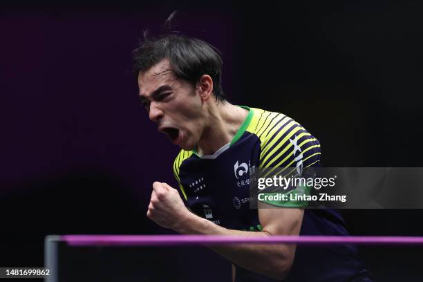Hugo Calderano of Brazil celebrates match point against Ruwen Filus of Germany in their Men's singles Round of 16 match on day 4 of WTT Champions...