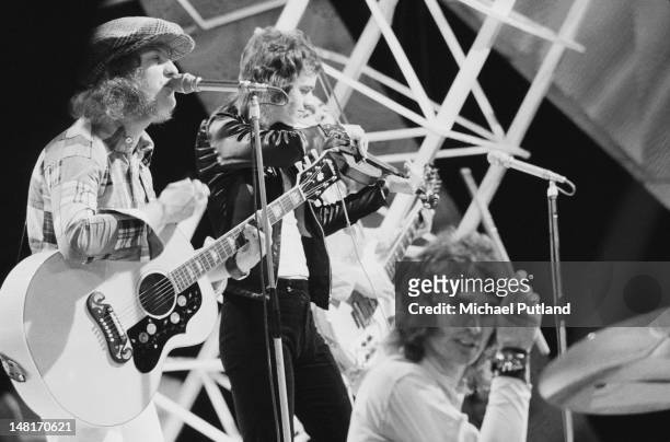 English pop group Slade performing on the BBC TV music programme 'Top Of The Pops', London, 10th November 1971. Left to right: Noddy Holder, Jim Lea,...
