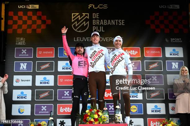 Ben Healy of Ireland and Team EF Education-EasyPost on second place, race winner Dorian Godon of France and AG2R Citroën Team and Benoît Cosnefroy of...