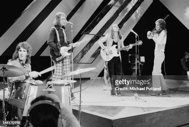 English pop group Slade performing on the Christmas edition of the BBC TV music programme 'Top Of The Pops', London, December 1971. Left to right:...