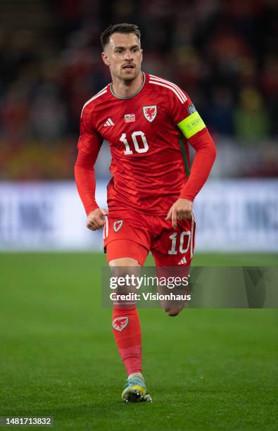 Aaron Ramsey of Wales in action during the UEFA EURO 2024 qualifying round group D match between Wales and Latvia at Cardiff City Stadium on March...