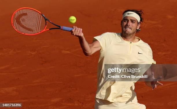 Taylor Fritz of the United States plays a forehand against Stan Wawrinka of Switzerland in their second round match during day four of the Rolex...