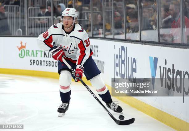 Rasmus Sandin of the Washington Capitals skates against the Boston Bruins during the first period at TD Garden on April 11, 2023 in Boston,...