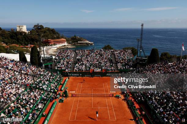 Lorenzo Sonego of Italy plays a forehand against Daniil Medvedev in their second round match during day four of the Rolex Monte-Carlo Masters at...