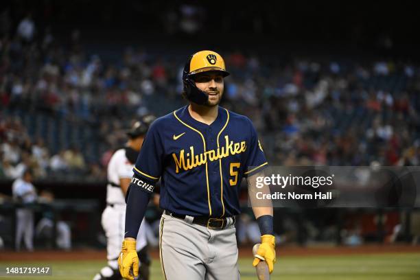 Garrett Mitchell of the Milwaukee Brewers walks back to the dugout against the Arizona Diamondbacks at Chase Field on April 11, 2023 in Phoenix,...