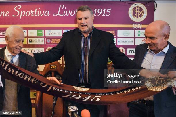 Livorno football club unveil new owner and President Joel Esciua during a press conference with Honorary President Enrico Fernandez Affricano and...