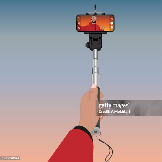selfie stick, take a selfie. - dramatic light portrait stock illustrations