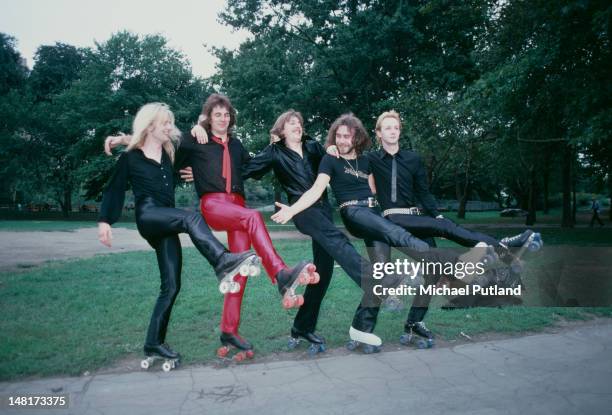 British heavy metal group Judas Priest wearing roller skates on a visit to Central Park, New York, August 1979. Left to right: KK Downing, Glenn...