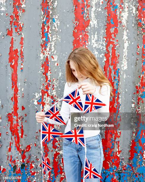 patriotic junior uk - kid national flag stock pictures, royalty-free photos & images