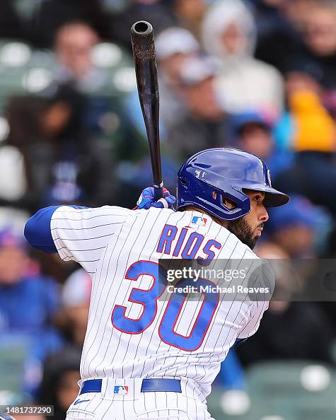 Edwin Rios of the Chicago Cubs at bat against the Milwaukee Brewers ...