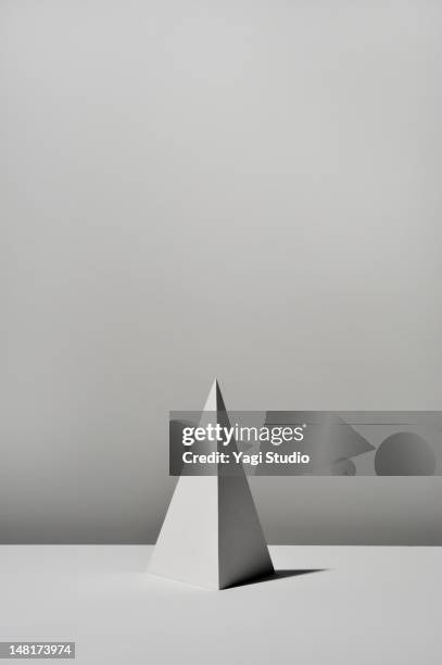 White Triangular Pyramid On White Background High-Res Stock Photo ...