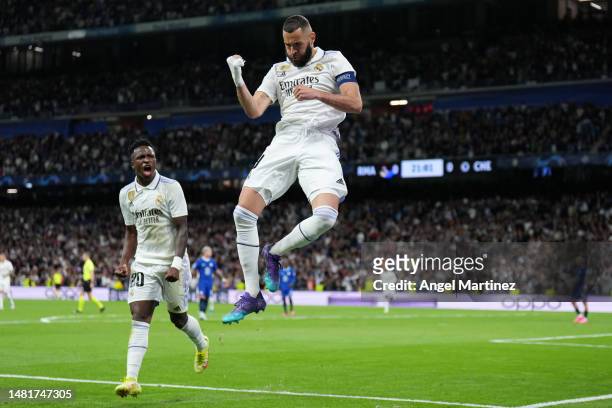 Karim Benzema of Real Madrid celebrates after scoring the team's first goal with teammate Vinicius Junior during the UEFA Champions League...