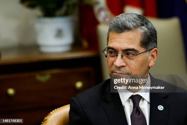 Health and Human Services Secretary Xavier Becerra listens as U.S. Vice President Kamala Harris speaks during the start of a meeting with Biden...