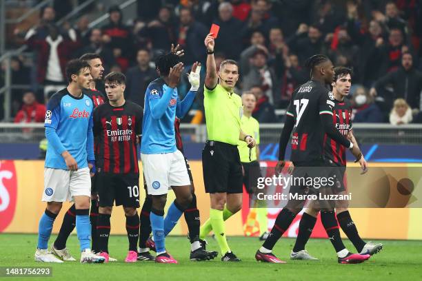 Andre-Frank Zambo Anguissa of SSC Napoli is shown a red card and is sent off by referee Istvan Kovacs during the UEFA Champions League quarterfinal...