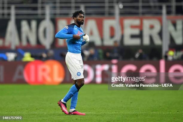 Andre-Frank Zambo Anguissa of SSC Napoli looks dejected as he leaves the field after being shown a red card during the UEFA Champions League...
