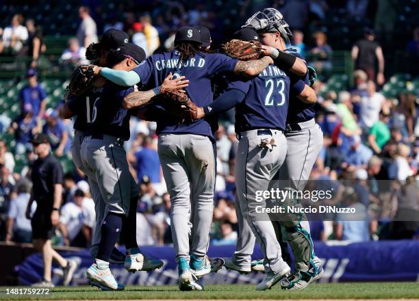 Seattle Mariners players dance to celebrate the end of their win over the Chicago Cubs at Wrigley Field on April 12, 2023 in Chicago, Illinois. The...