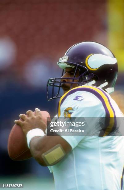 Quarterback Warren Moon of the Minnesota Vikings warms up in the game between the Minnesota Vikings vs the New York Giants at Giants Stadium on...