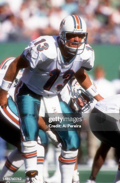 Quarterback Dan Marino of the Miami Dolphins calls a play in the game between the Miami Dolphins vs the New York Jets at The Meadowlands on October...