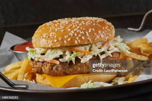 juicy pork cheeseburger with creamy coleslaw - coleslaw stock pictures, royalty-free photos & images