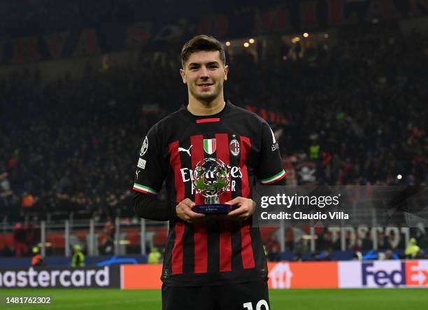 Brahim Diaz of AC Milan receives the prize for the best player of the match at the end of the UEFA Champions League quarterfinal first leg match...