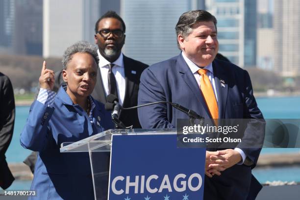 Mayor Lori Lightfoot speaks to business and political leaders including Mayor-elect Brandon Johnson and Illinois Governor J.B. Pritzker during an...