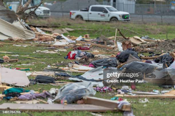 personal belongings and debris on the ground from homes and buildings destroyed after a tornado - heather storm stock pictures, royalty-free photos & images