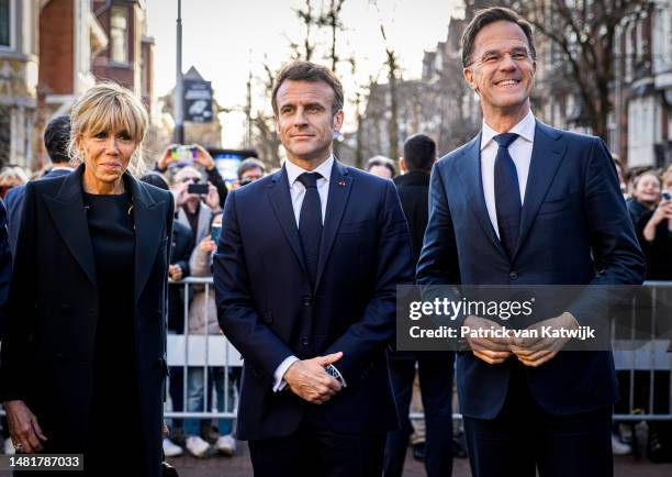 French First Lady Brigitte Macron, French President Emmanuel Macron and Dutch Prime Minister Mark Rutte arrive at the Rijksmuseum for a visit to the...