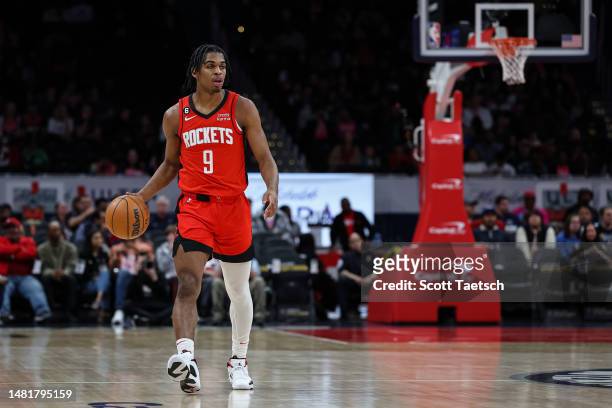 Josh Christopher of the Houston Rockets brings the ball up court against the Washington Wizards during the first half at Capital One Arena on April...