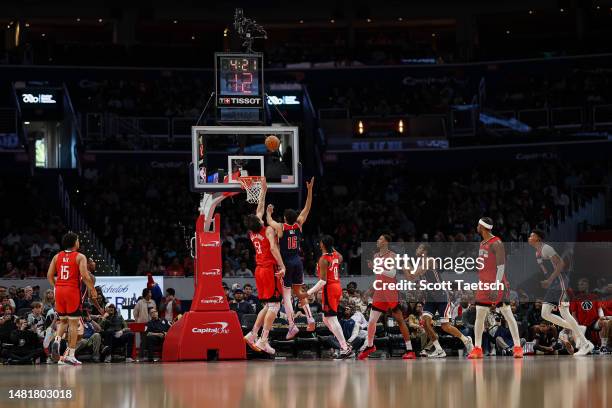 General view as Boban Marjanovic of the Houston Rockets and Anthony Gill of the Washington Wizards vie for the ball during the first half at Capital...