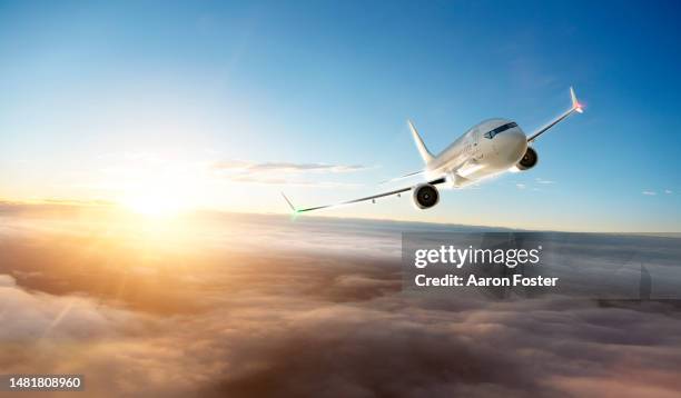 gerneric aircraft in flight - aircraft planes aaron foster stock pictures, royalty-free photos & images