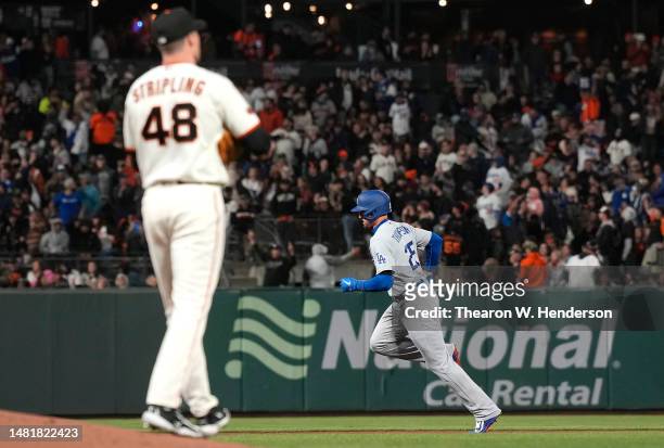 Trayce Thompson of the Los Angeles Dodgers trots around the bases after hitting a two-run home run off of Ross Stripling of the San Francisco Giants...