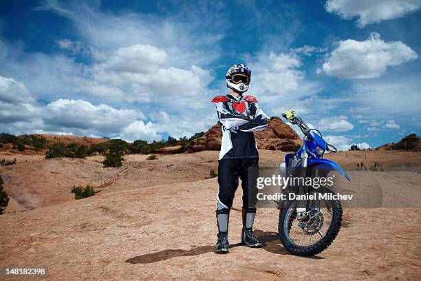 bike on a red rock - motocross foto e immagini stock