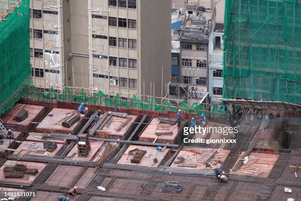 hopewell centre ii construction site in wan chai, hong kong island - hopewell centre stock pictures, royalty-free photos & images