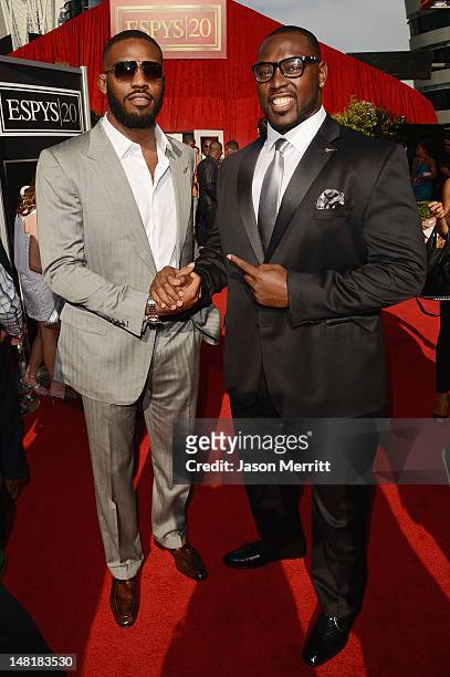 Fighters Jon Jones and Anderson Silva arrives at the 2012 ESPY Awards at Nokia Theatre L.A. Live on July 11, 2012 in Los Angeles, California.