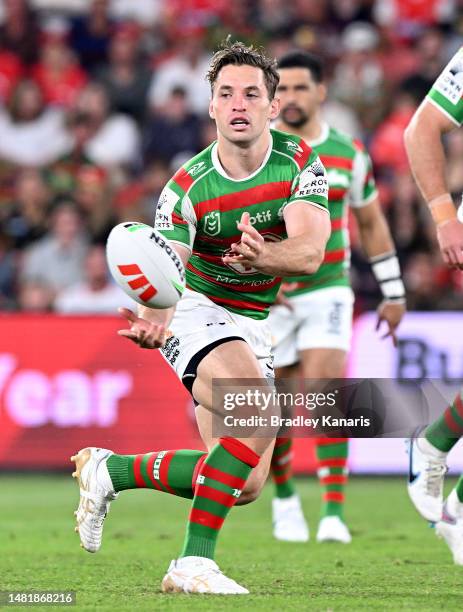 Cameron Murray of the Rabbitohs passes the ball during the round seven NRL match between the Dolphins and South Sydney Rabbitohs at Suncorp Stadium...