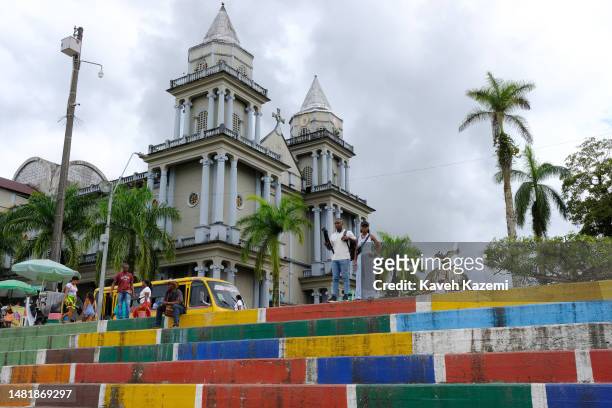 People seen on the street in front of the city cathedral on 20 January 2023 in Quibdo, Colombia.